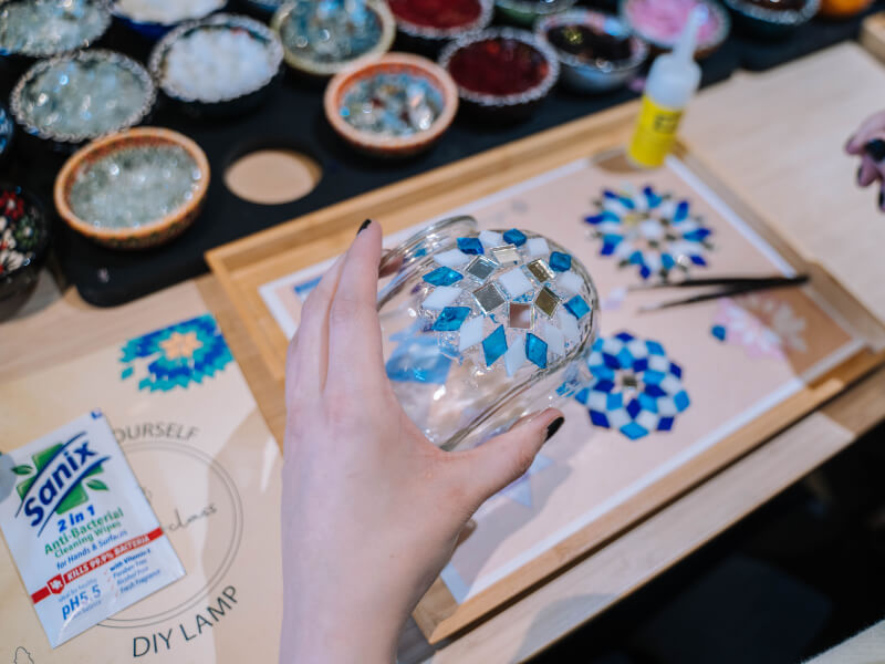 A half-made mosaic lamp